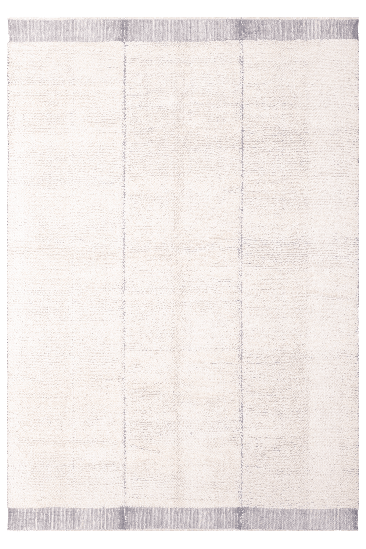 Silver gray handwoven shaggy wool rug with a soft high-pile texture and subtle vertical striped detailing.
