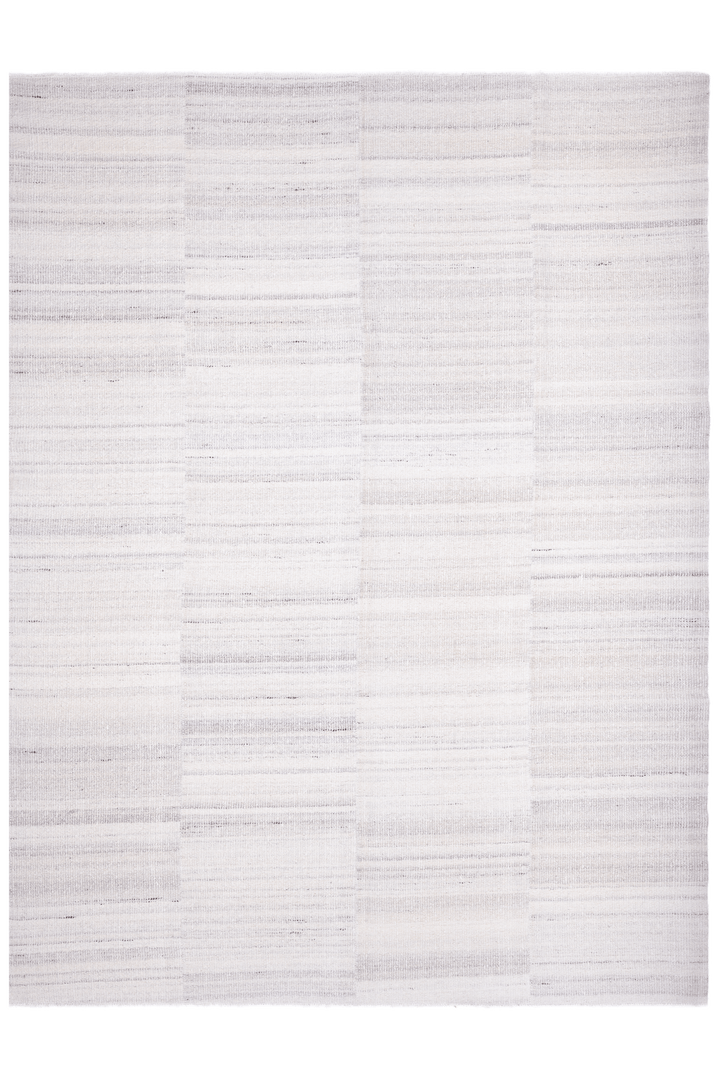 Minimalist white handwoven wool and cotton flatweave rug with a subtle, textured horizontal striped pattern.