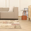 5x7 ft vintage Turkish patchwork area rug in wool and cotton with colorful floral patterns in a modern living room.