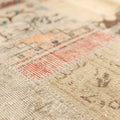 Handmade 5x7 patchwork Turkish rug in wool and cotton with vintage floral patterns and a vibrant, eclectic color mix.