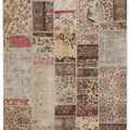 Handmade 5x7 patchwork Turkish area rug featuring vintage floral patterns in a mix of wool and cotton with earthy tones.