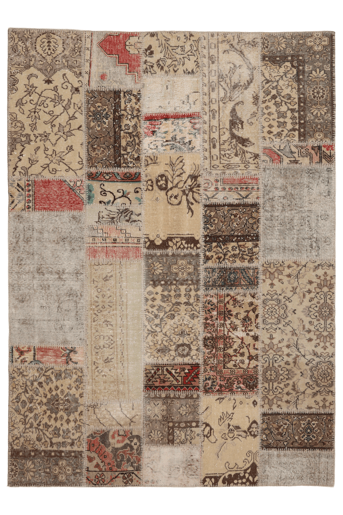 Handmade 5x7 patchwork Turkish area rug featuring vintage floral patterns in a mix of wool and cotton with earthy tones.