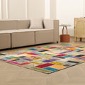 5x8 ft handmade Turkish patchwork area rug with vibrant, multi-colored floral patterns in wool and cotton.