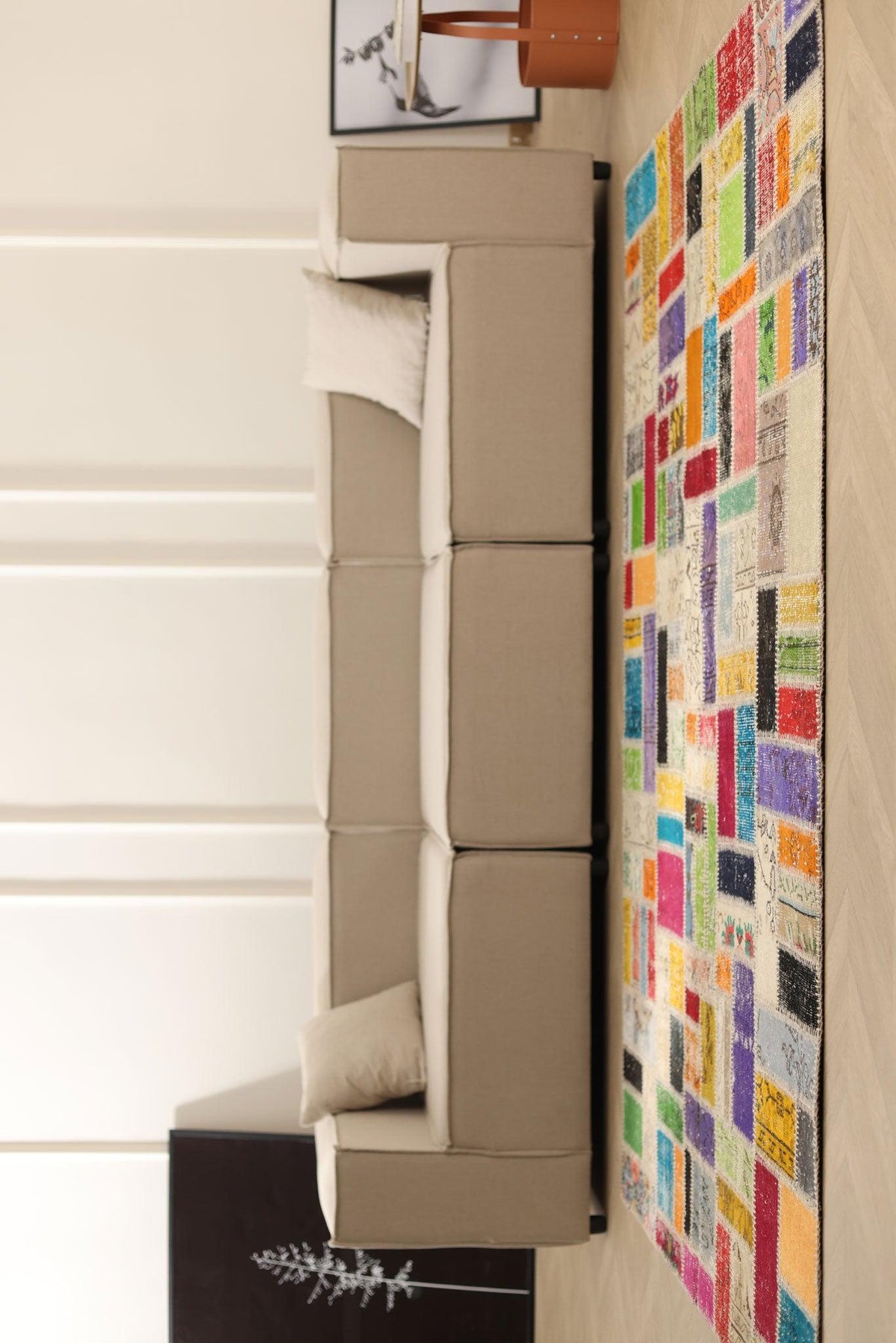 5x8 ft handmade patchwork Turkish area rug with vibrant, multicolored floral patterns in wool and cotton.