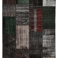 5x7 ft black patchwork Turkish rug with distressed, overdyed wool and cotton patterns in a bohemian style.