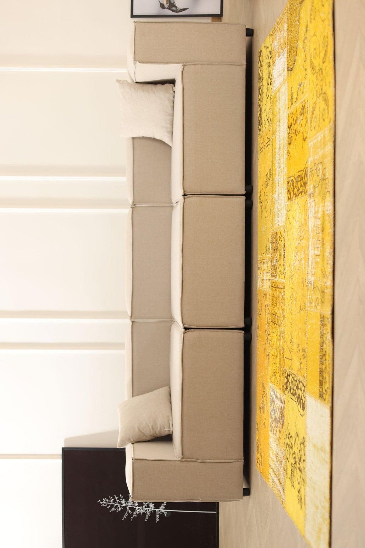5x7 ft yellow patchwork Turkish area rug in wool and cotton with vintage overdyed patterns in a bohemian living room.