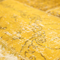 Handmade yellow patchwork Turkish area rug with overdyed vintage patterns in wool and cotton.