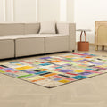 5x8 ft handmade patchwork Turkish area rug featuring vibrant multi-colored floral patterns in wool and cotton.
