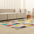 Handmade 5x7 ft patchwork Turkish area rug featuring vibrant, multi-colored floral patterns in wool and cotton.