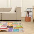 Handmade 5x7 ft vintage Turkish patchwork area rug with vibrant geometric patterns in wool and cotton.