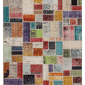 5x7 ft vintage Turkish patchwork area rug featuring vibrant, hand-stitched geometric wool and cotton fabric squares.