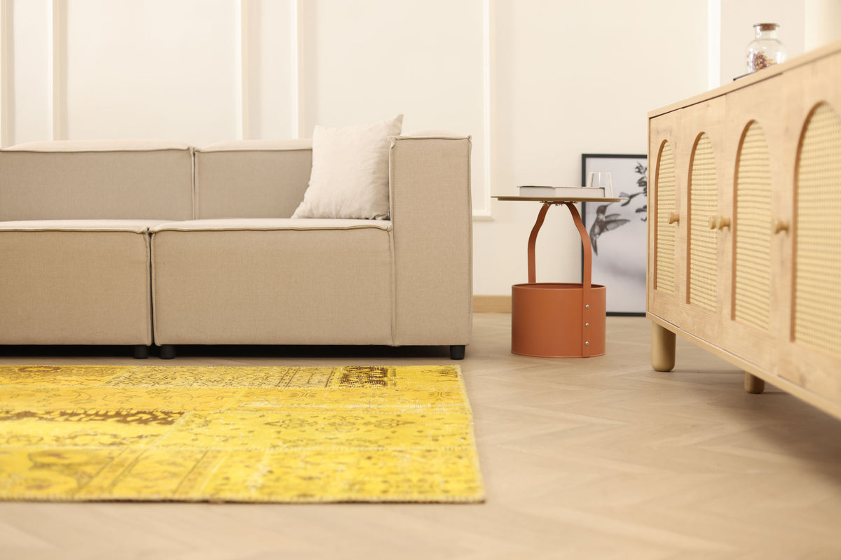 5x7 ft yellow patchwork Turkish area rug made of wool and cotton in a bohemian living room.