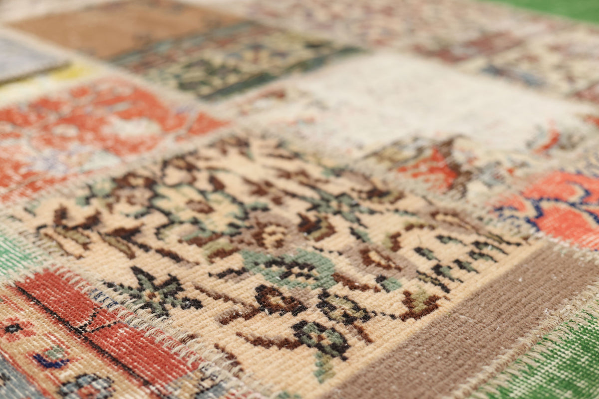 Handmade 5x7 ft vintage Turkish patchwork rug featuring vibrant floral patterns in wool and cotton with a bohemian aesthetic.