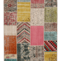 Handmade 5x7 ft vintage Turkish patchwork area rug featuring vibrant geometric patterns in wool and cotton.
