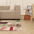 5x7 ft vintage Turkish patchwork area rug with vibrant floral patterns, hand-stitched wool and cotton in a bohemian room.