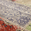Handmade 5x7 ft vintage Turkish patchwork rug featuring vibrant floral patterns in wool and cotton with eclectic colors.