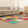5x7 ft handmade Turkish patchwork area rug featuring vibrant, multi-colored floral wool and cotton squares.