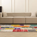 Handmade 5x7 ft Turkish patchwork area rug featuring vibrant, multi-colored floral patterns in wool and cotton.