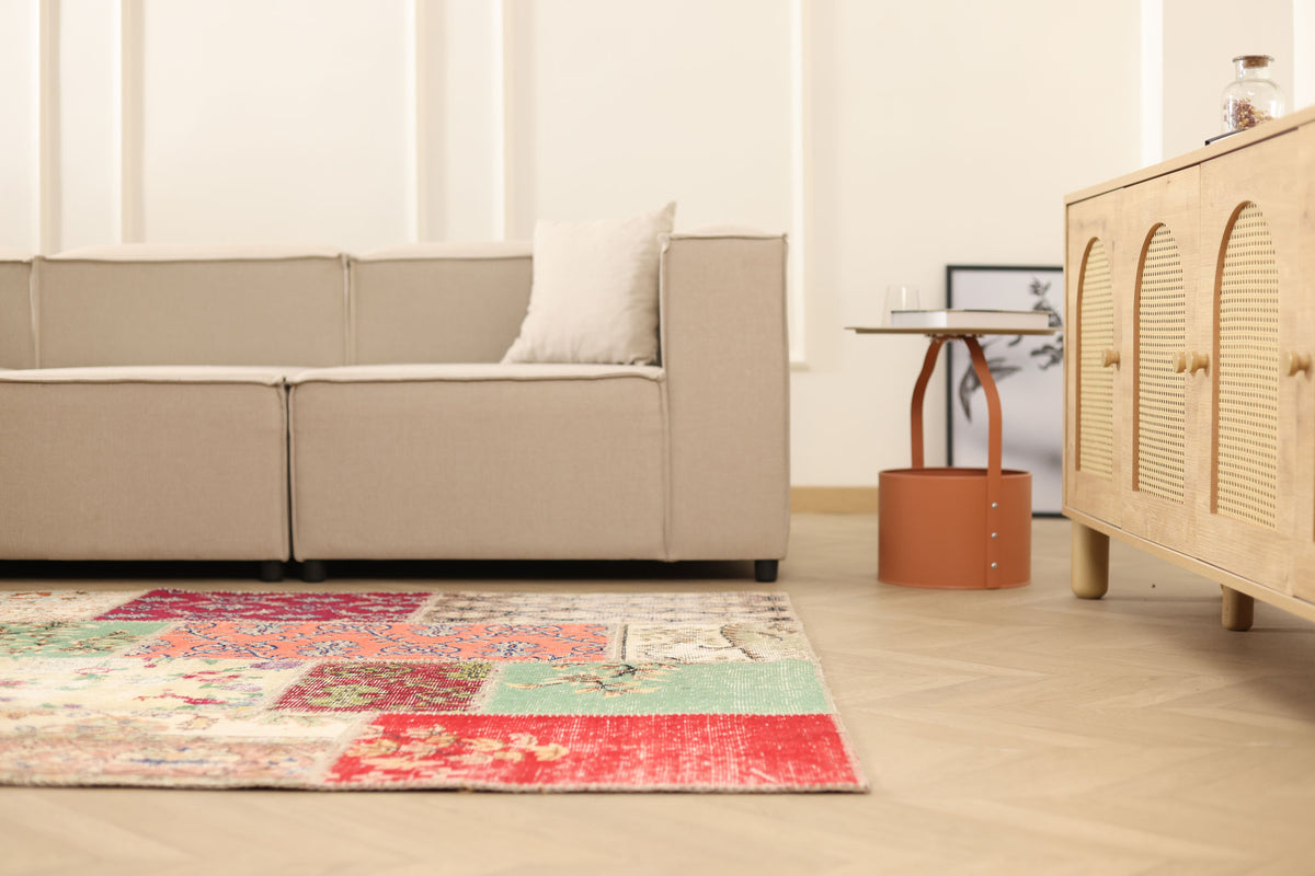 5x7 ft vintage Turkish patchwork area rug with vibrant floral patterns, handmade from wool and cotton in a bohemian style.