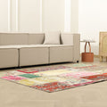 Handmade 5x7 ft vintage Turkish patchwork area rug featuring vibrant floral patterns in wool and cotton in a modern living room.