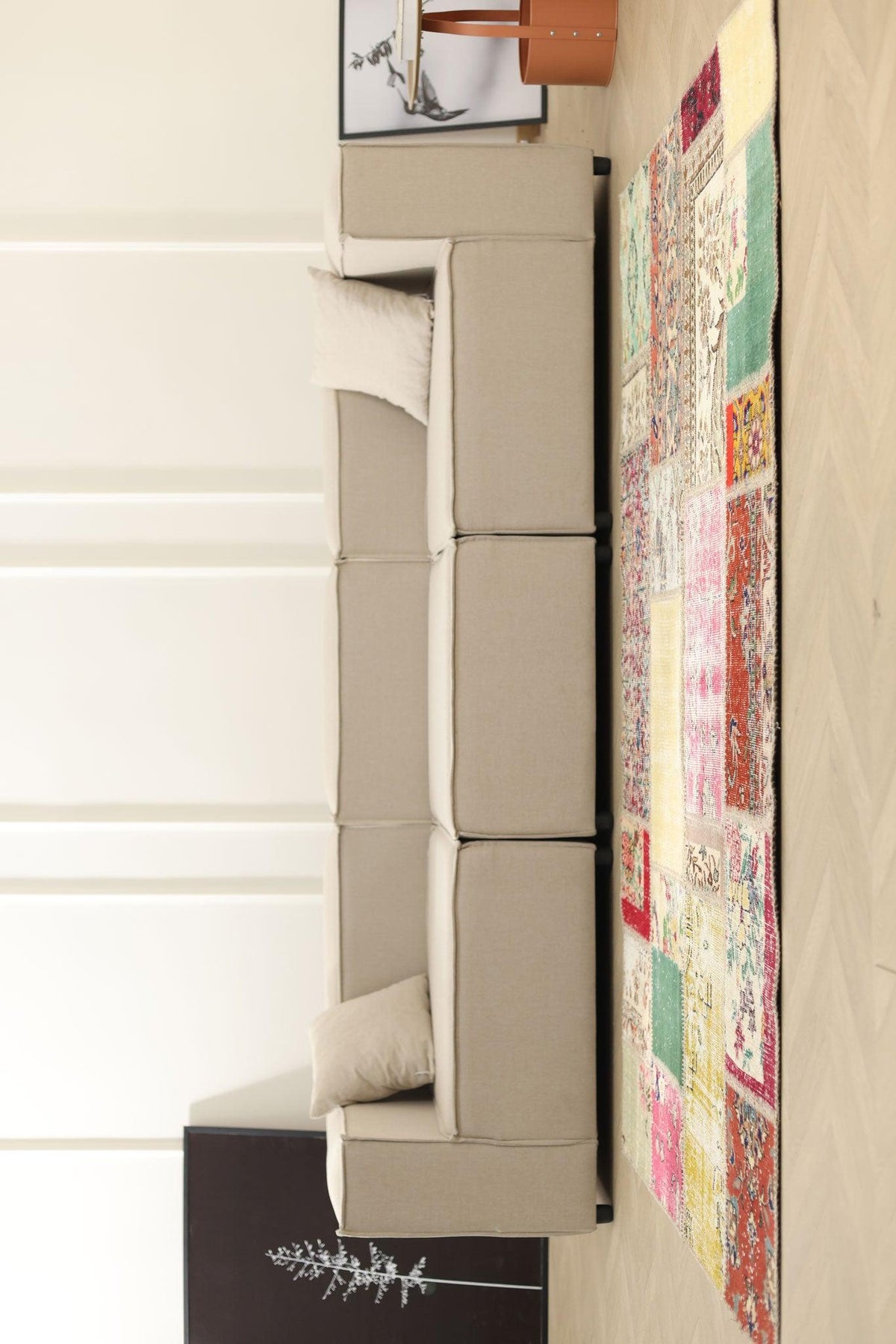 Handmade 5x7 ft patchwork Turkish wool and cotton rug with vibrant, multicolored floral patterns in a bohemian style.