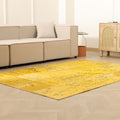 5x7 ft yellow patchwork Turkish area rug in wool and cotton with vintage overdyed patterns in a bohemian living room.