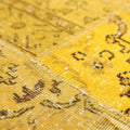 Yellow vintage Turkish patchwork rug with overdyed wool and cotton patterns in a 5x7 bohemian style.