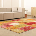 6x7 ft vintage Turkish patchwork area rug in vibrant yellow and red wool-cotton blend with bohemian overdyed patterns.