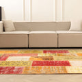 6x7 ft handmade Turkish patchwork rug in vibrant yellow and red wool and cotton, featuring a bohemian overdyed design.