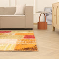6x7 ft handmade vintage Turkish patchwork rug in vibrant yellow and red wool-cotton blend with bohemian overdyed patterns.