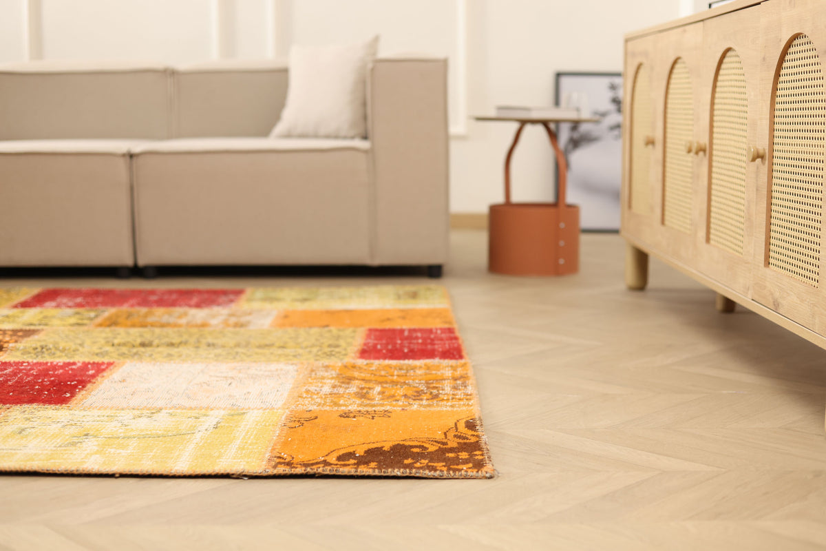 6x7 ft handmade vintage Turkish patchwork rug in vibrant yellow and red wool-cotton blend with bohemian overdyed patterns.