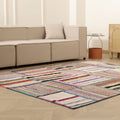 Handmade 6x8 ft vintage Turkish patchwork area rug featuring vibrant multicolored striped patterns in wool and cotton.