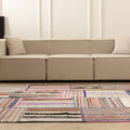 Handmade 6x8 ft vintage Turkish patchwork area rug featuring vibrant multi-colored striped patterns in wool and cotton.