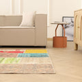 Handmade 5x7 patchwork Turkish area rug featuring vibrant geometric patterns in wool and cotton on a herringbone floor.