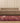 Vintage Isparta Turkish Area Rug 6x9 ft — Red & Beige Distressed
