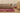 Vintage Isparta Turkish Area Rug 6x9 ft — Red & Beige Distressed