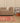 Vintage Isparta Turkish Area Rug 5x8 ft — Red & Beige Distressed