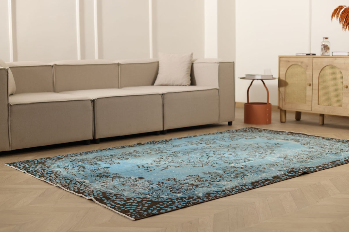 Vintage Isparta Turkish Area Rug 5x8 ft — Blue & Brown Floral