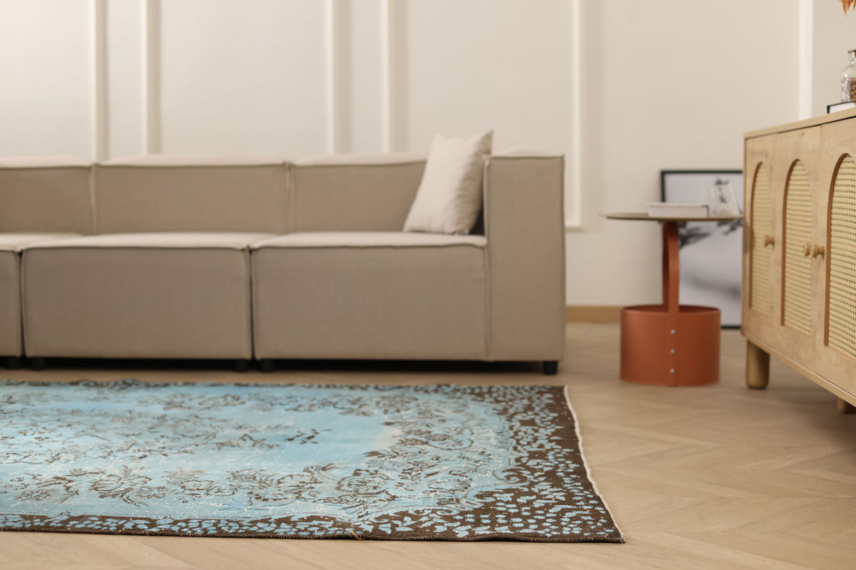 Vintage Isparta Turkish Area Rug 5x8 ft — Blue & Brown Floral