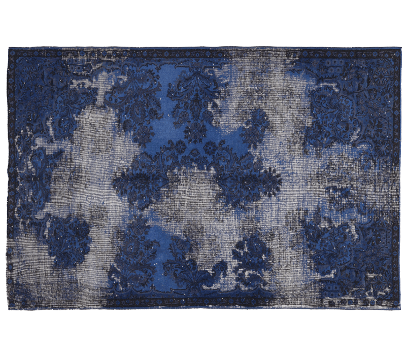 Blue and gray patterned rug on a white background