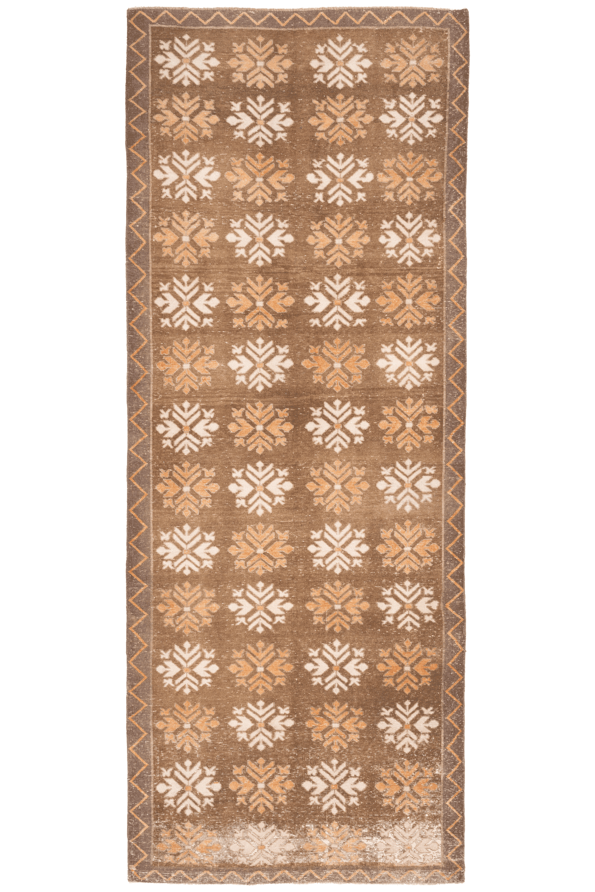 Handwoven 4x12 ft vintage Turkish runner rug in brown and beige with geometric tribal patterns and wool-cotton blend.