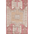 Handwoven 4x11 ft vintage Turkish runner rug in red and pink wool with traditional geometric tribal patterns.