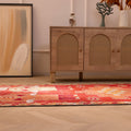 Handmade 3.3x11.5 ft Persian style runner rug in red and orange wool-cotton blend with traditional human figure patterns.