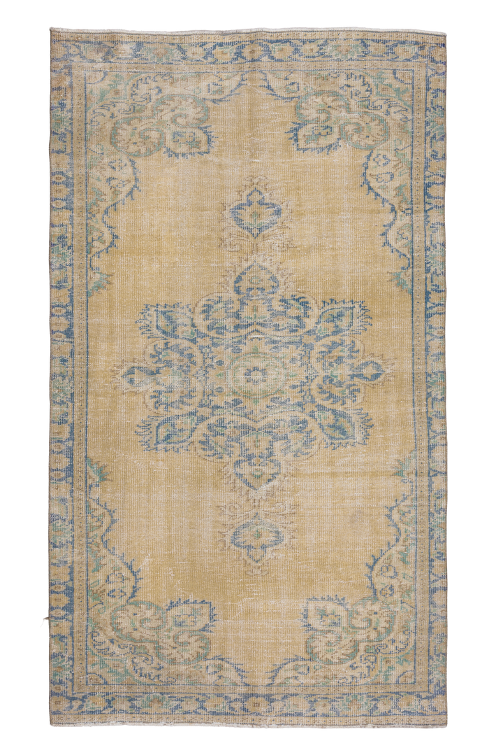 Hand-woven vintage Manisa Turkish rug in yellow and blue with traditional floral patterns, 4x8 ft wool and cotton blend.