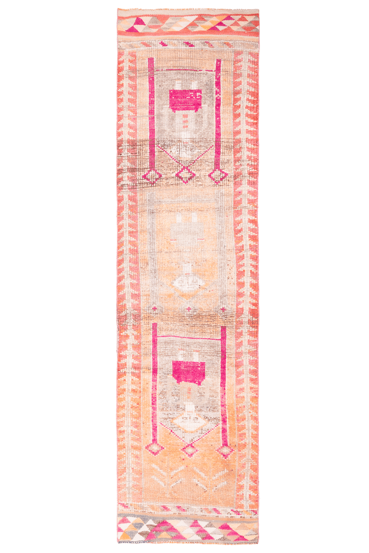 Handmade 2.7x9.9 ft wool and cotton runner rug in bohemian style with orange, yellow, and pink human-figured patterns.