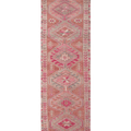 Handmade 2.7x12.6 ft wool and cotton runner rug in brown and pink with a bohemian floral Persian-style pattern.