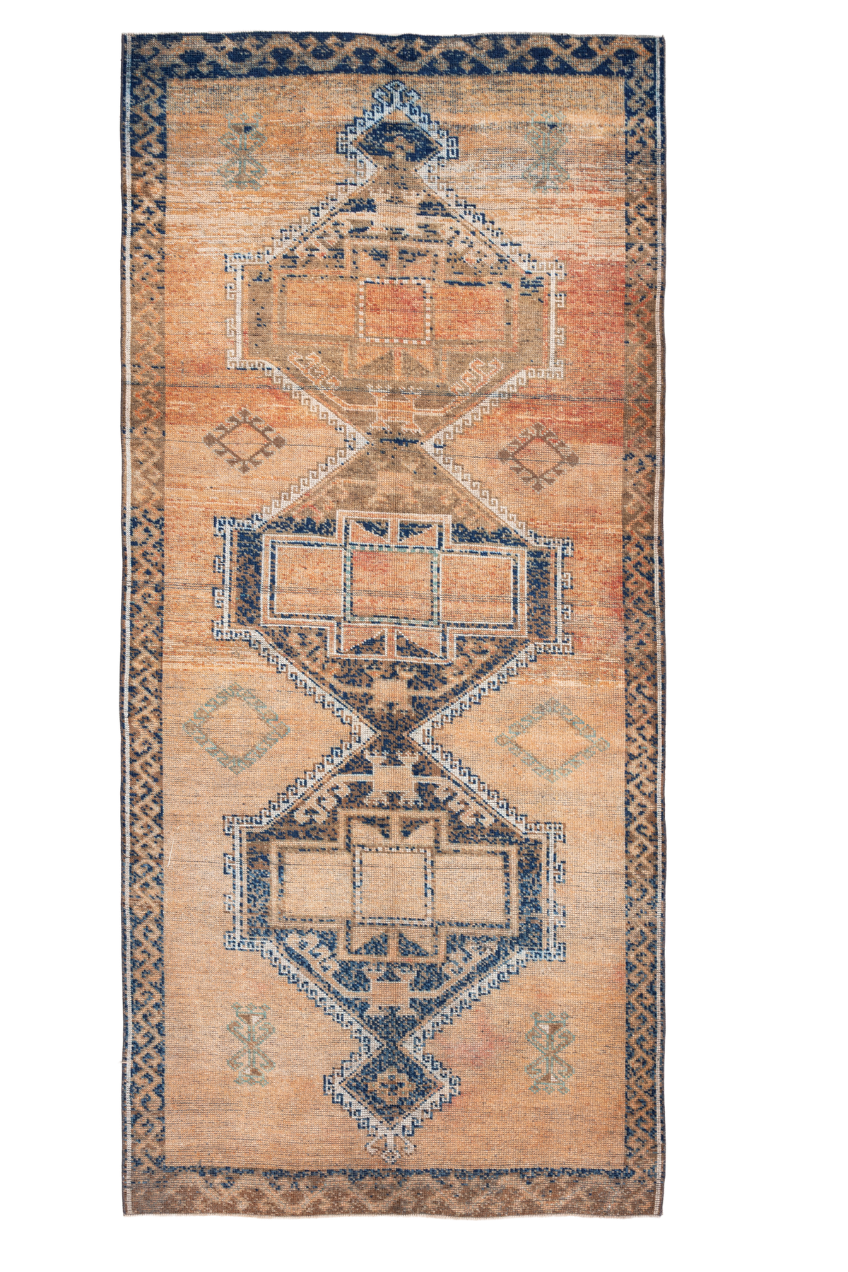 Vintage 4x11 ft Turkish runner rug in orange and brown wool with geometric tribal patterns and a distressed low-pile finish.
