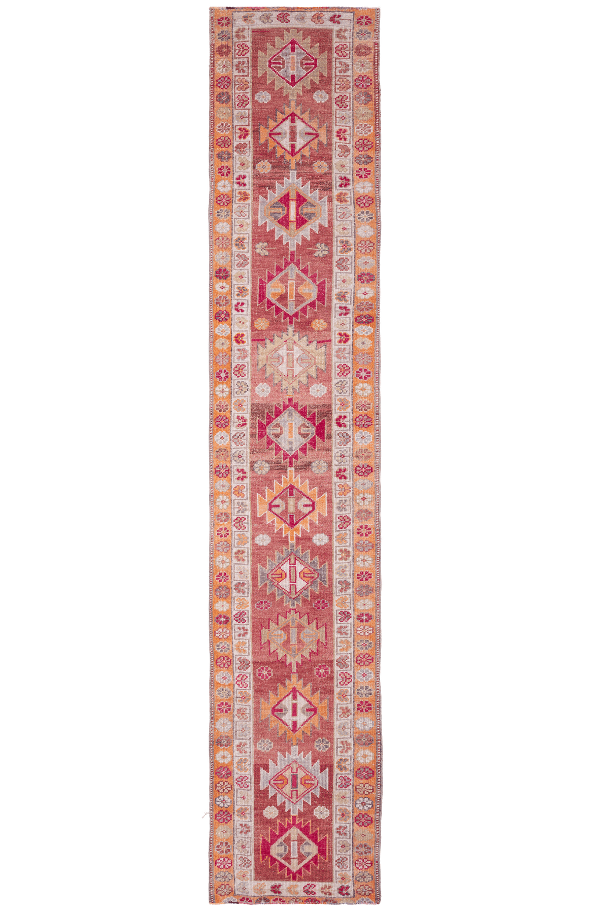 Handmade 2.6x13.5 ft wool and cotton Persian-style runner rug in red and orange with maximalist floral patterns.