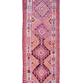 Handmade 3.4x11.3 ft wool and cotton Persian-style kilim runner in vibrant orange and pink with maximalist geometric patterns.