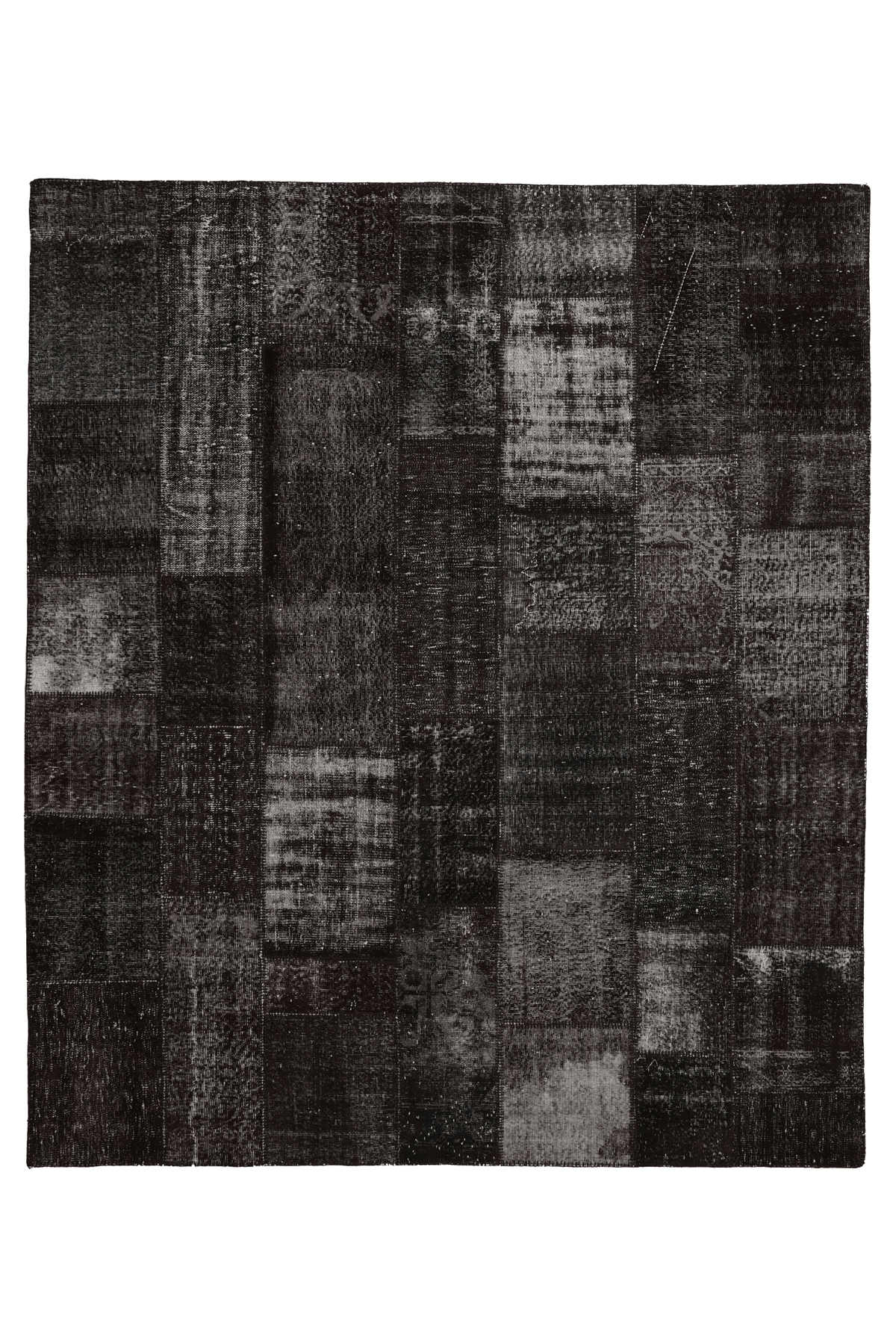 8x9 ft black patchwork Turkish area rug featuring distressed, hand-stitched wool and cotton patterns in a bohemian style.
